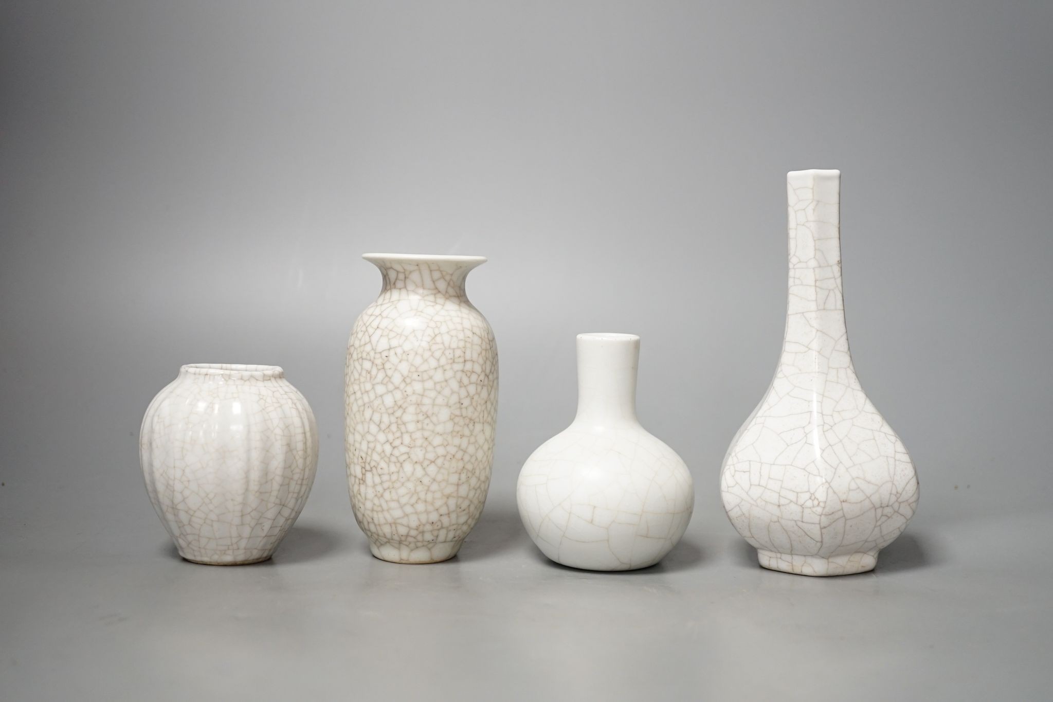 Four Chinese crackle glaze vases, tallest 16 cms high.